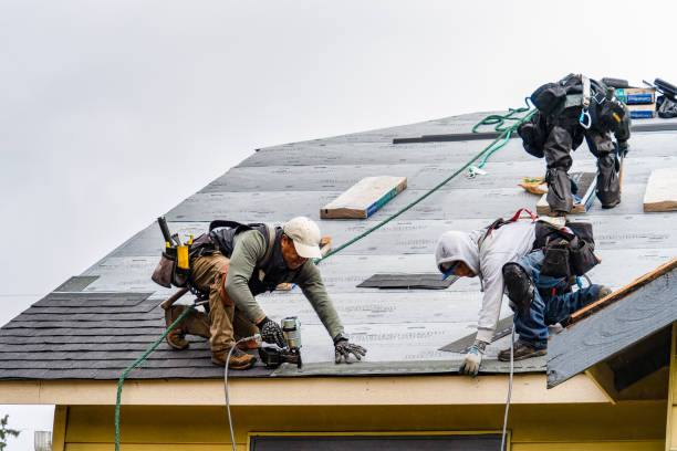 Professional Gutter Installation technician working in Russells Point, OH